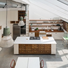 This kitchen has loads of direct natural light thanks to its glass ceiling