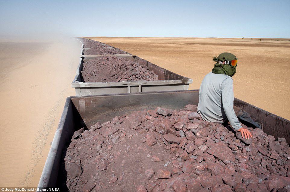 Train hopping thorough the Sahara on one of the world's longest trains