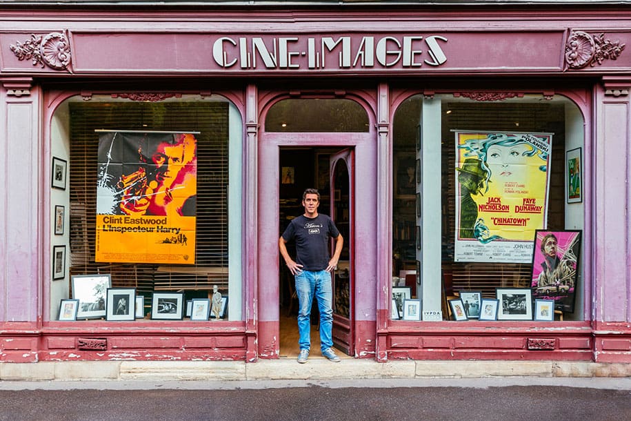 Alexandre Boyer, surrounded by pictures and posters from the history of cinema